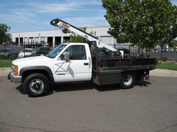 General Motors 3500 4x4 9' Flatbed Crane Truck