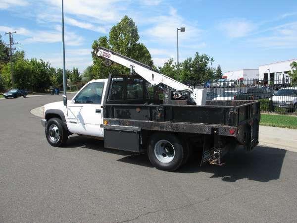 General Motors 3500 4x4 9' Flatbed Crane Truck