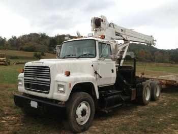 Ford L9000 Day Cab with Altec Boom Crane